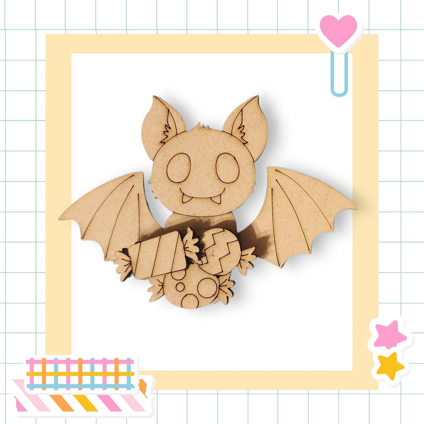 A wooden bat-shaped figure holding a candy-filled heart, set against a yellow and white grid background with a pink heart and a pink star sticker.