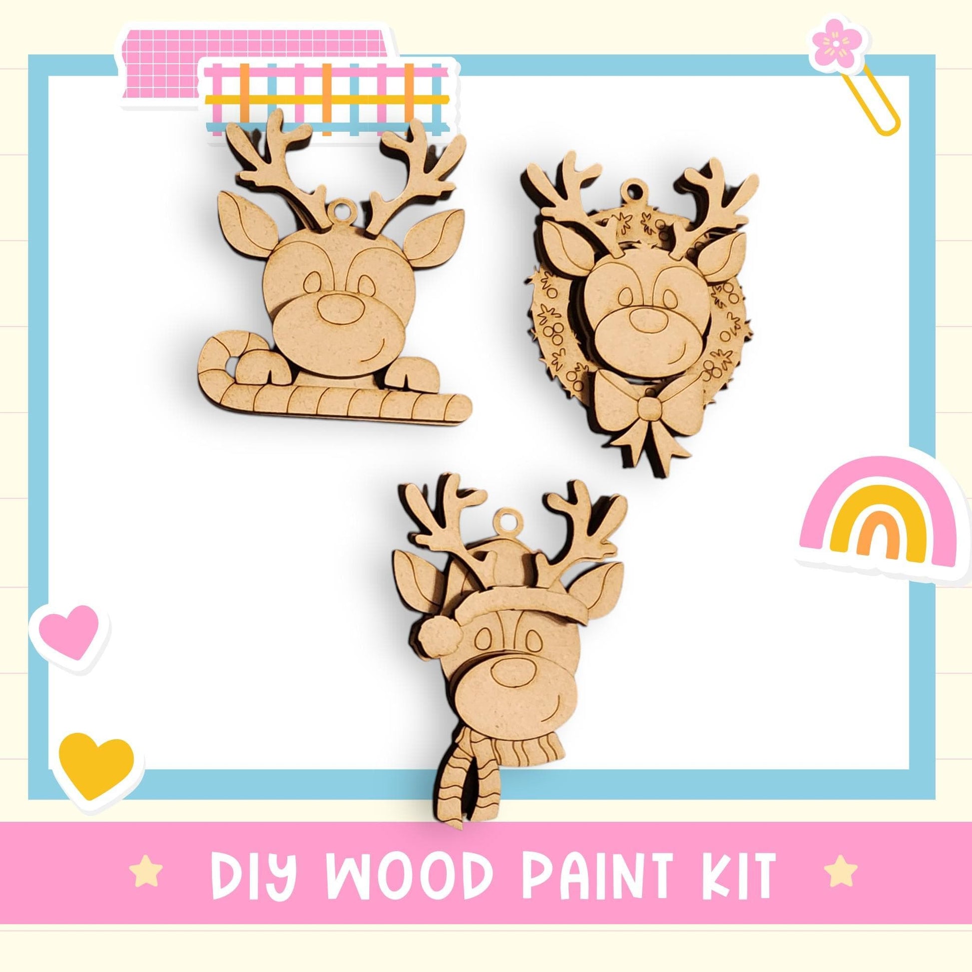 a DIY wood paint kit with three wooden reindeer ornaments, each with unique designs and decorations.
