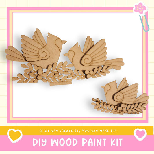 a DIY wood paint kit, with a focus on a bird-shaped design. The kit appears to be made of wood and is designed for creating bird-shaped decorations or ornaments.