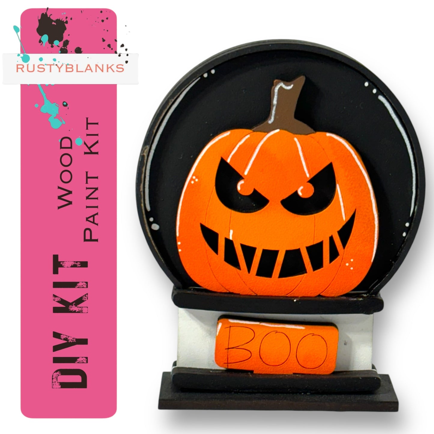 a Halloween-themed DIY paint kit, including a pumpkin with a carved face and the word "BOO" written on it.