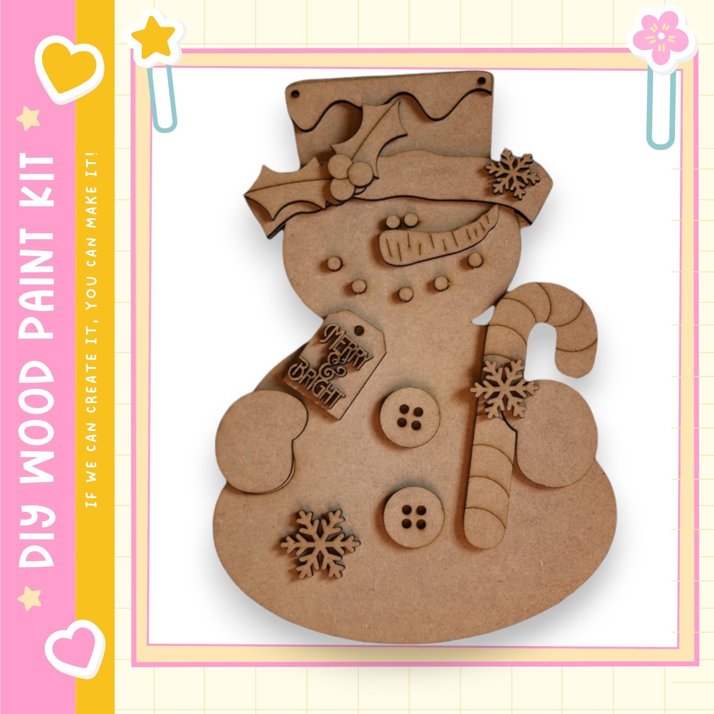 A wooden snowman kit with various decorations and accessories, including a carrot, buttons, and a hat.