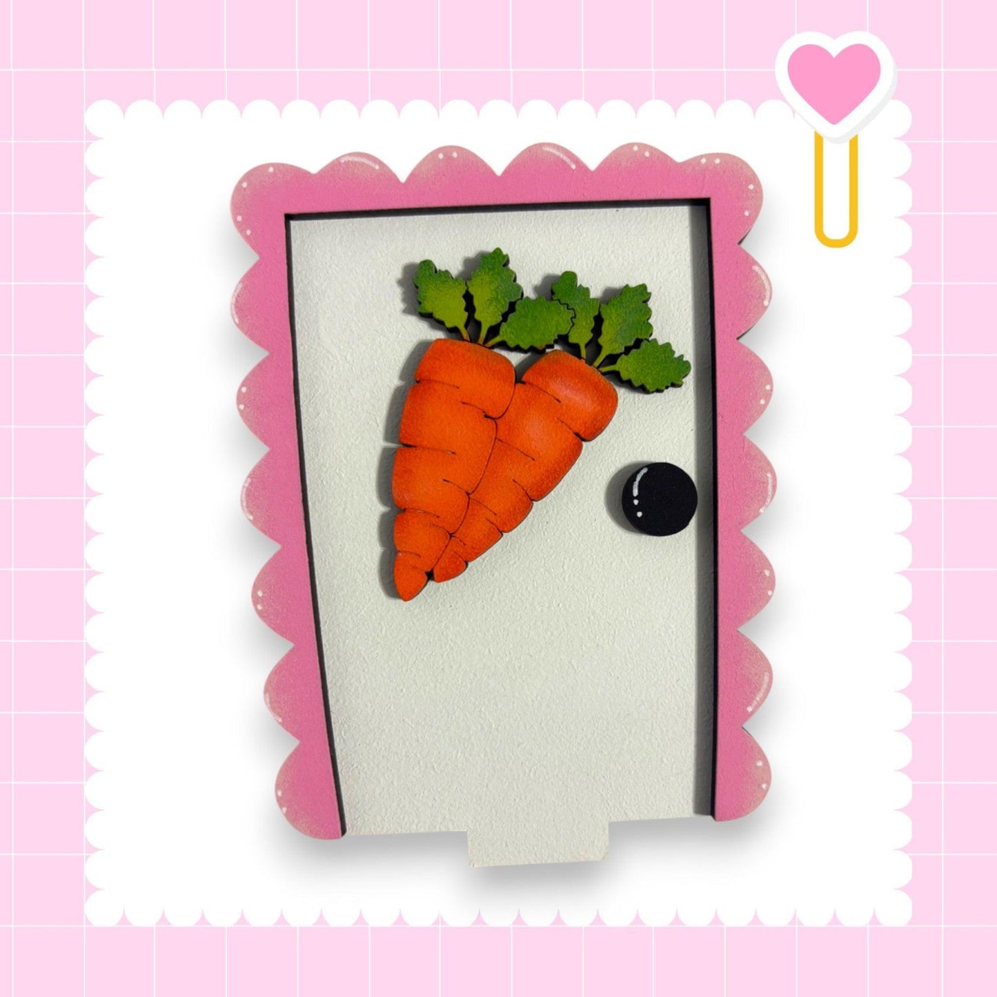 a picture of a carrot with a green leaf on it