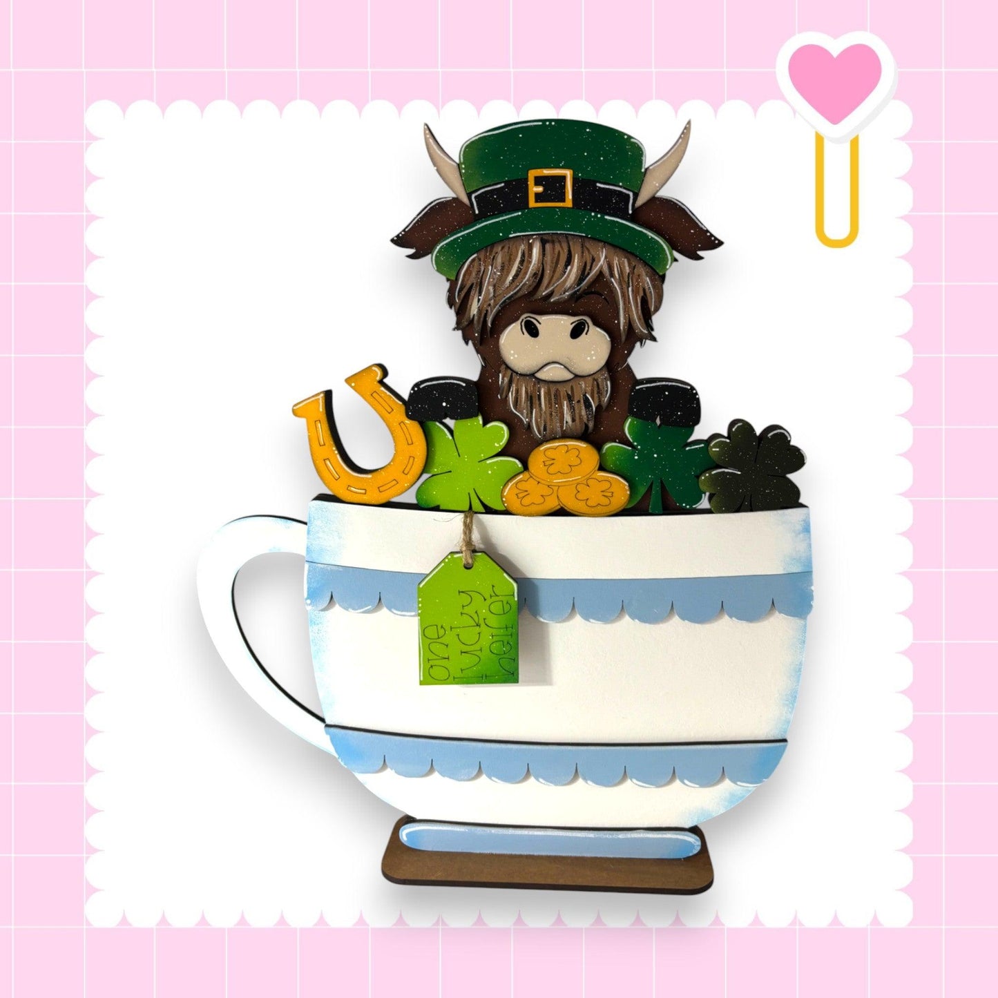 a cup of coffee with a cow in it