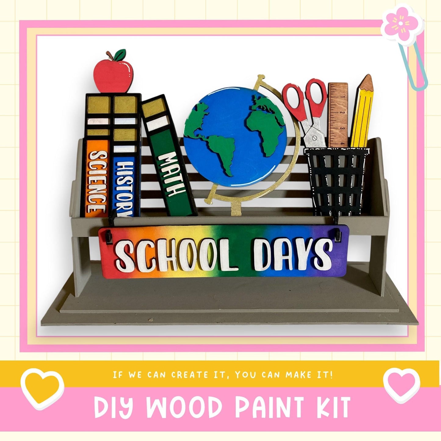 a school day craft kit with a globe, books, pencils, scissors,