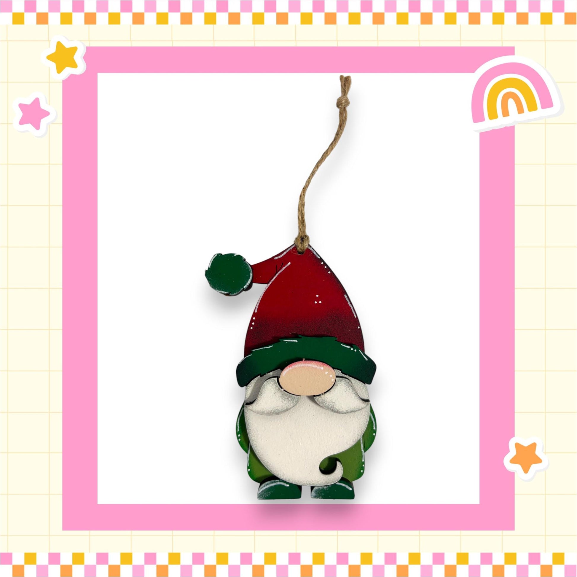 A wooden gnome ornament with a red hat and green trim, hanging from a string.