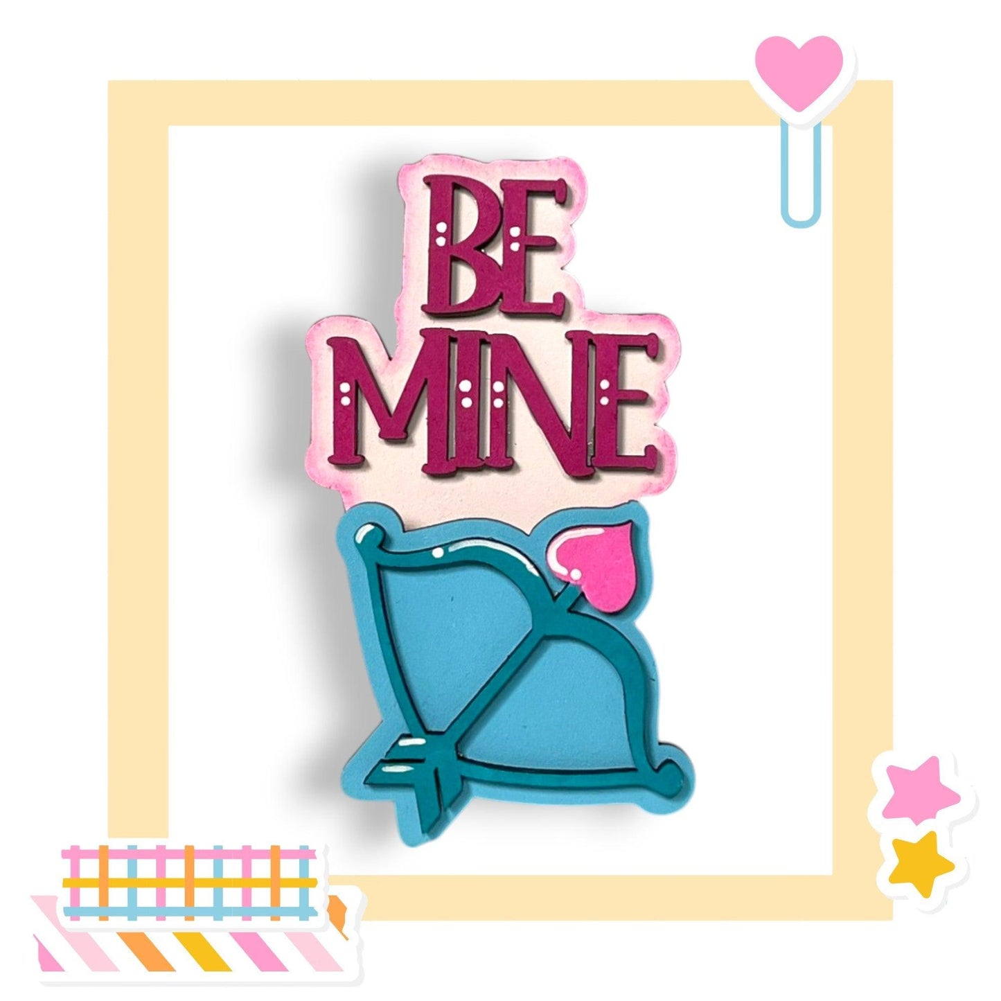 a cookie with the words be mine on it
