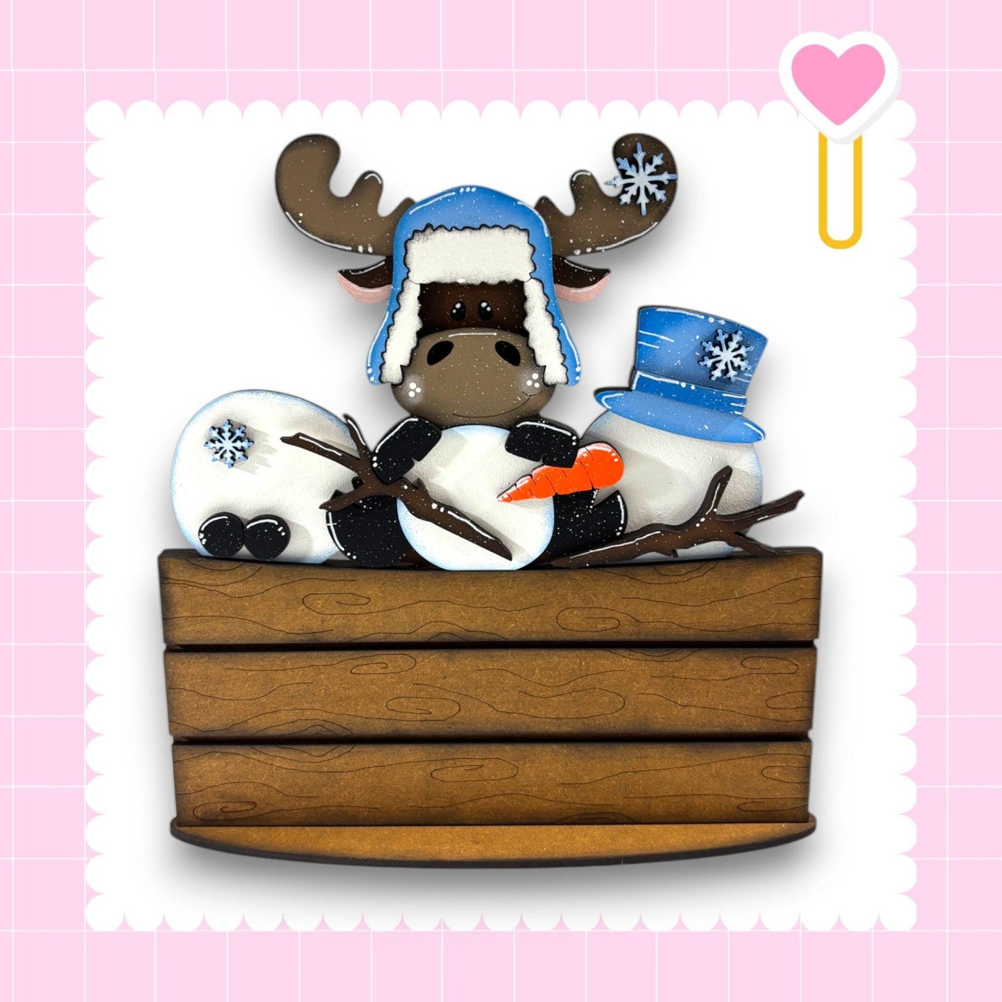 a greeting card with a picture of a snowman and a moose
