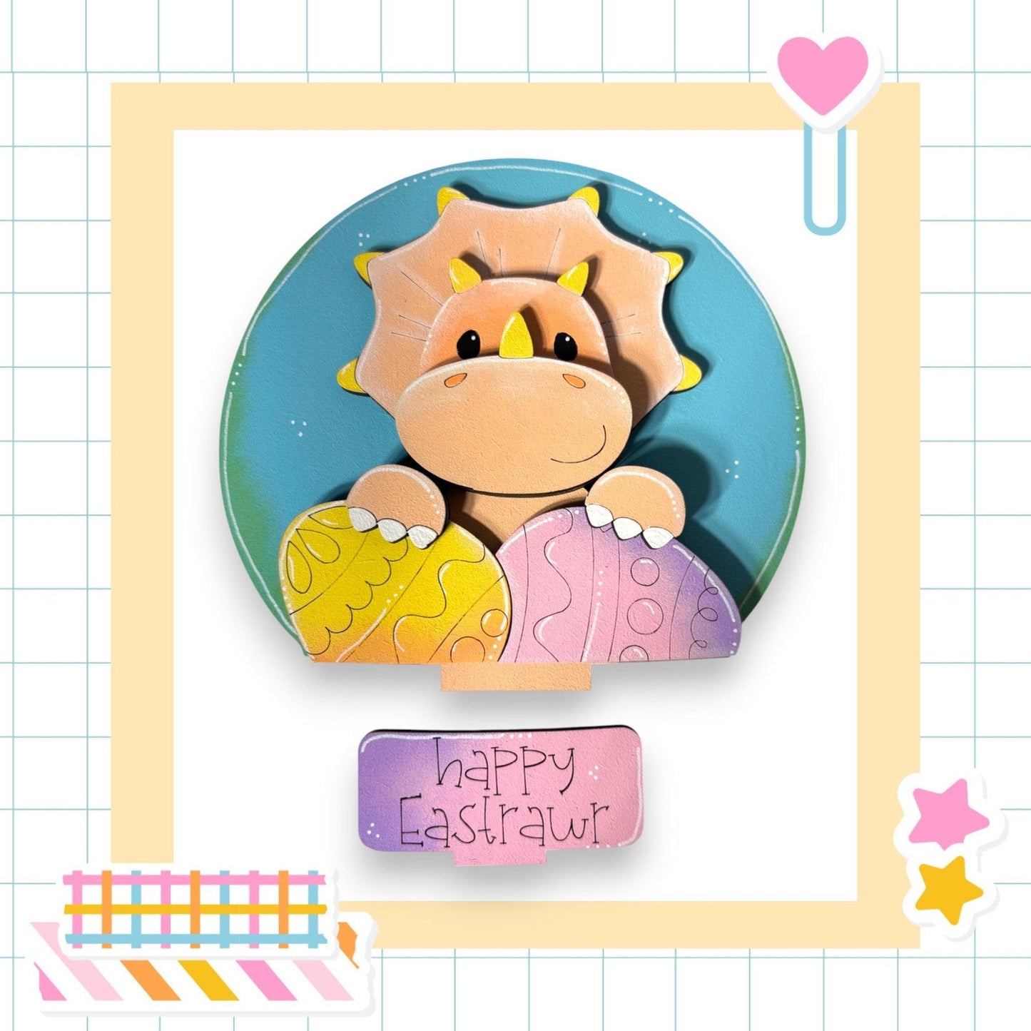 a card with a picture of a dinosaur holding an egg