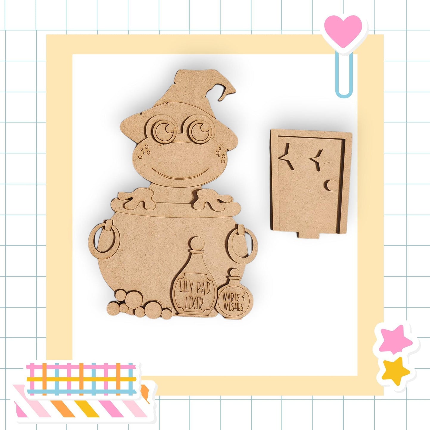 A wooden cutout of a wizard or magical character, with various accessories and text, set against a grid background with a heart and stars.