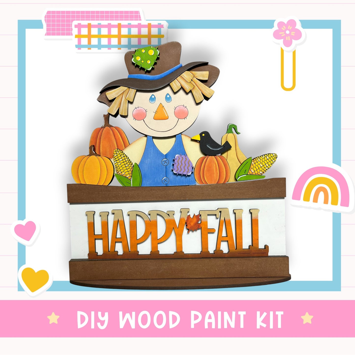 A wooden scarecrow figure holding a sign that says "HAPPY FALL" is surrounded by various fall-themed objects such as pumpkins, corn, and a bird.