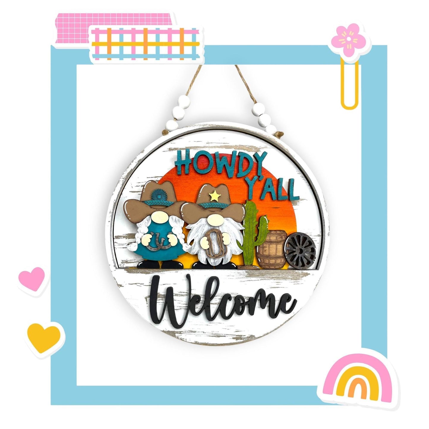 a picture of a welcome sign hanging from a wall