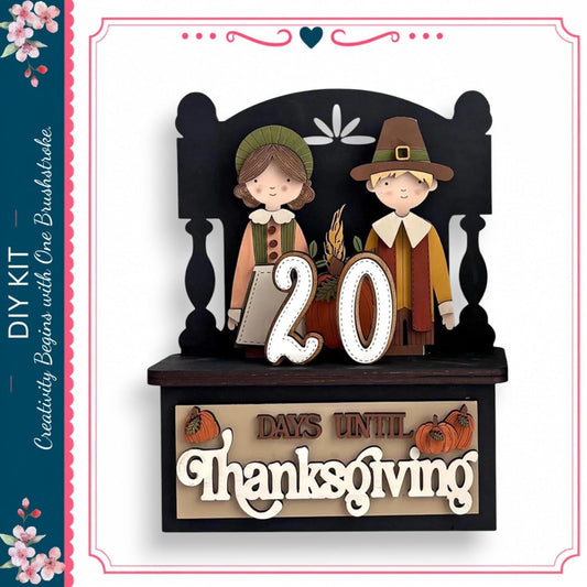 A decorative wooden sign with the number "20" and the phrase "DAYS UNTIL THANKSGIVING" indicating the number of days until Thanksgiving. The sign is set against a black background with a floral border.