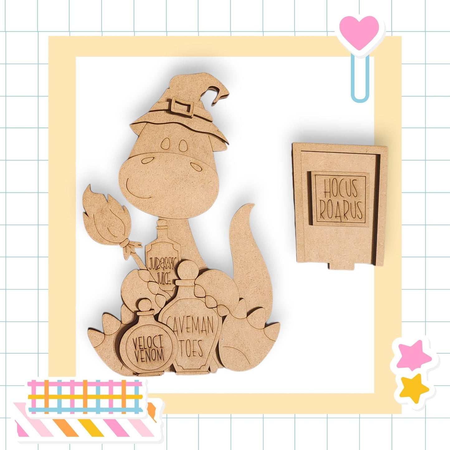 A wooden toy dinosaur wearing a witch's hat and holding a broom, with a sign that says "Hocus Roarus" next to it.