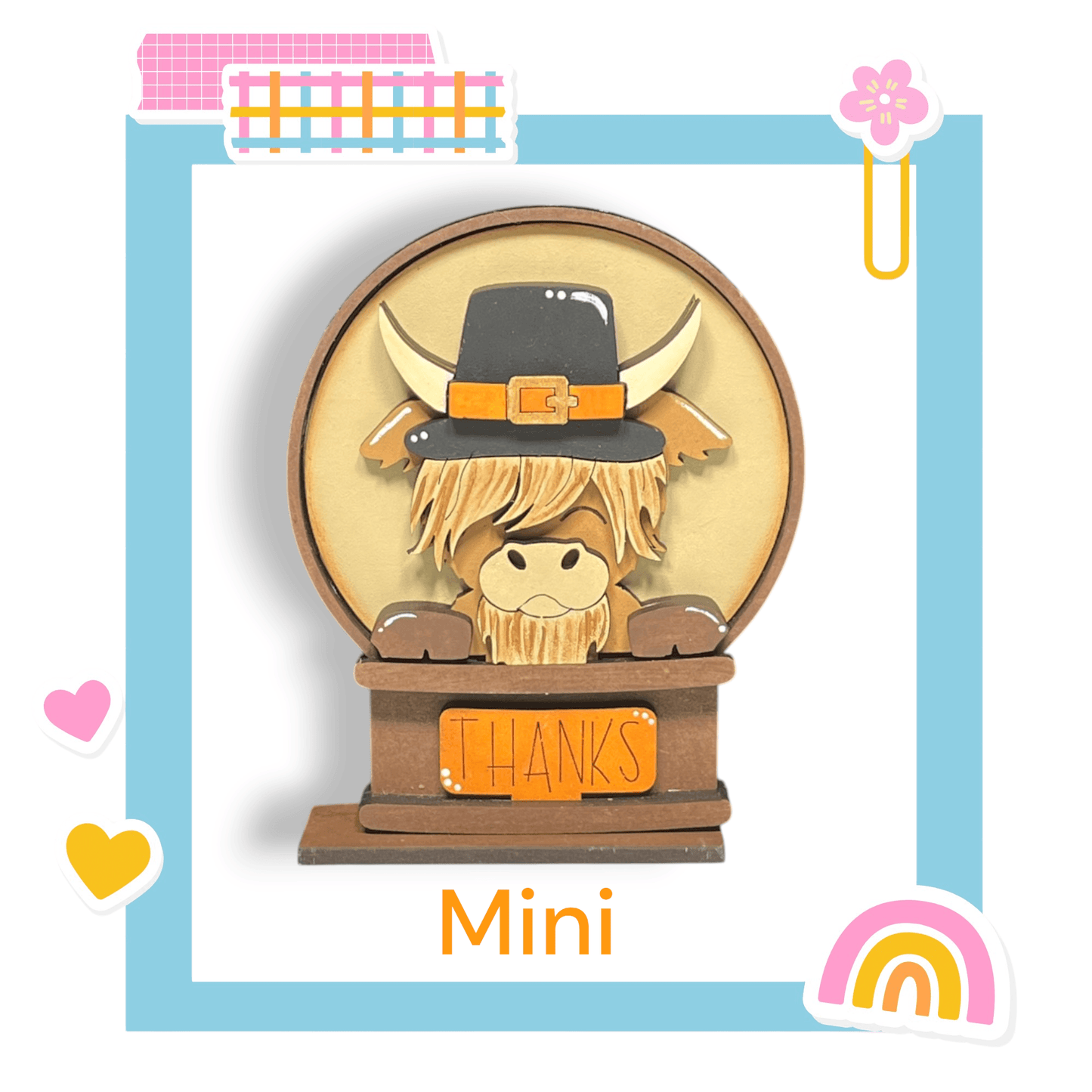 a picture of a cow with a hat on it's head