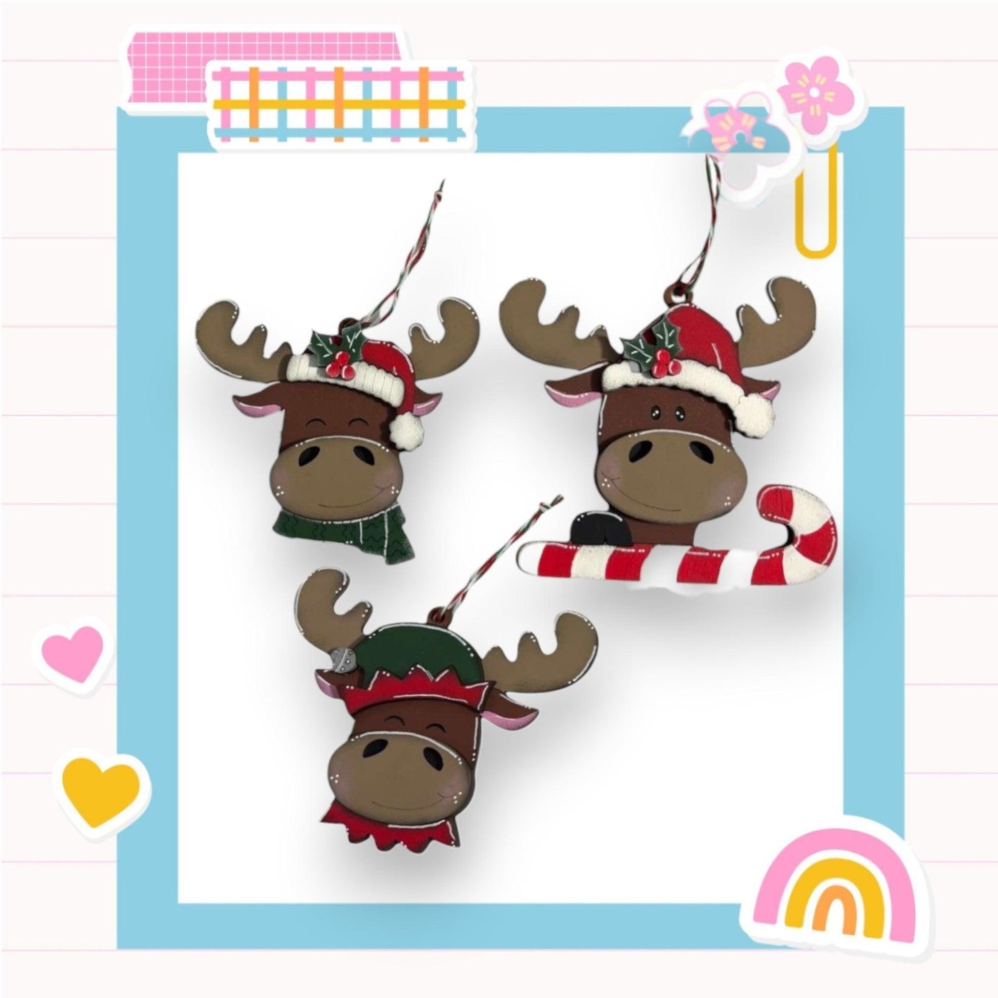 three christmas moose ornaments hanging from a string