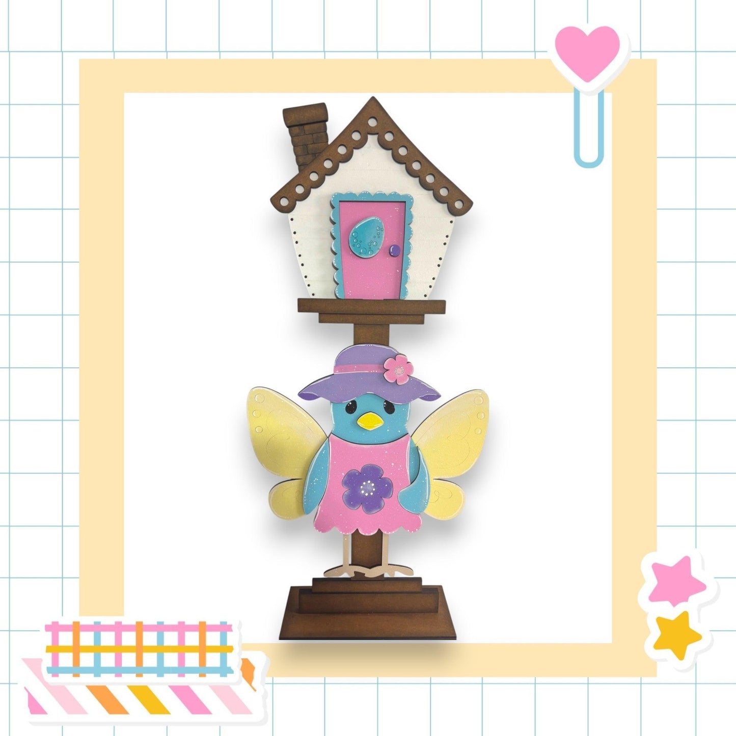 a card with a bird and a birdhouse