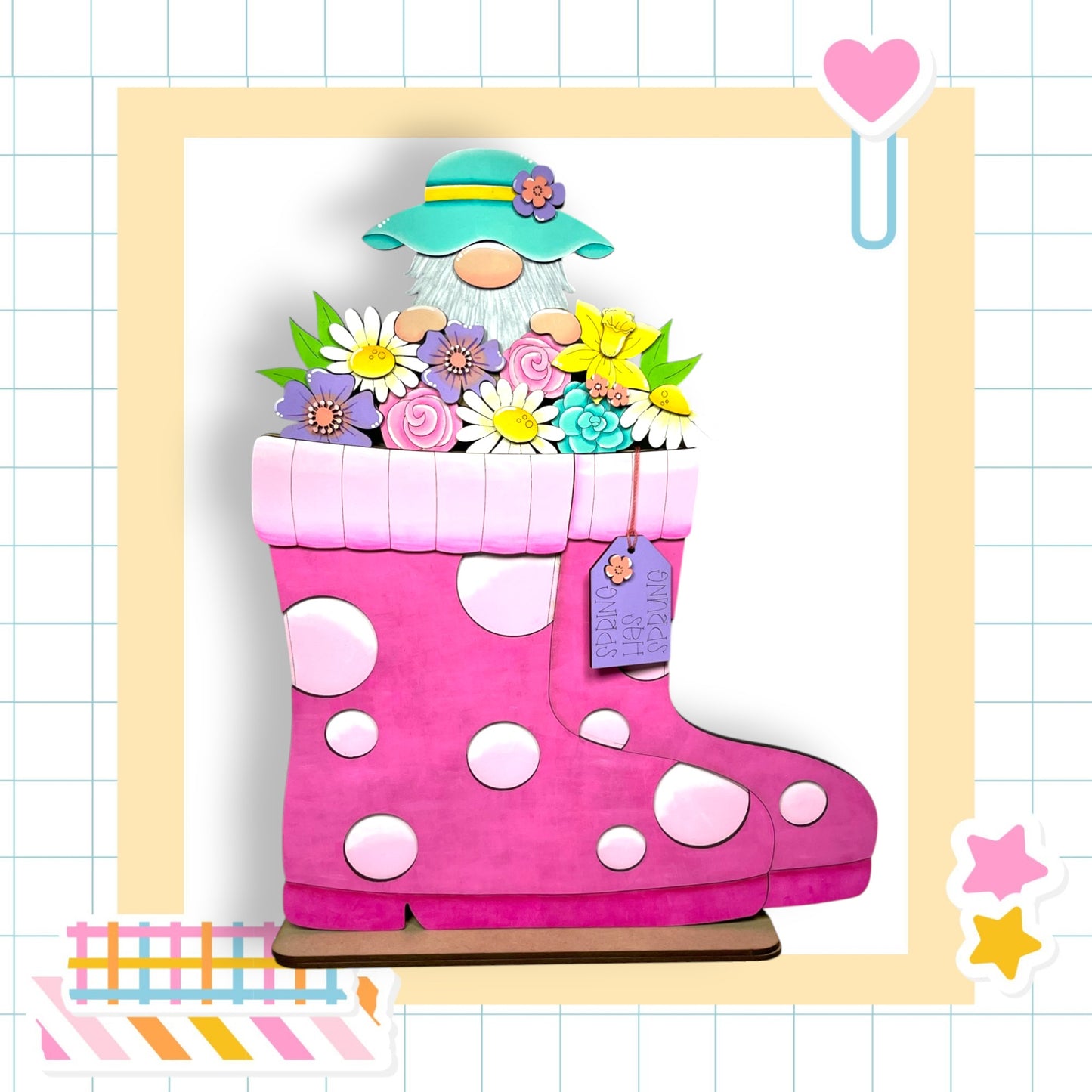 A pink polka dot rain boot filled with colorful flowers, including daisies, roses, and sunflowers, is the central focus of the image.