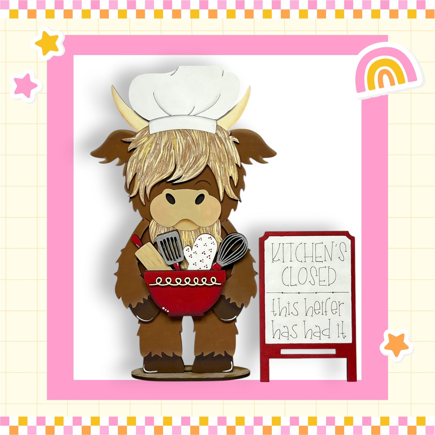 A cartoon cow wearing a chef's hat and holding a red bowl with cooking utensils, standing next to a sign that says "Kitchen's Closed".