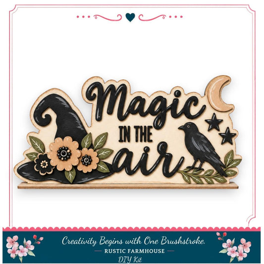 The image is a wooden sign with the text "Magic in the air" and decorative elements such as a witch's hat, flowers, and a bird.