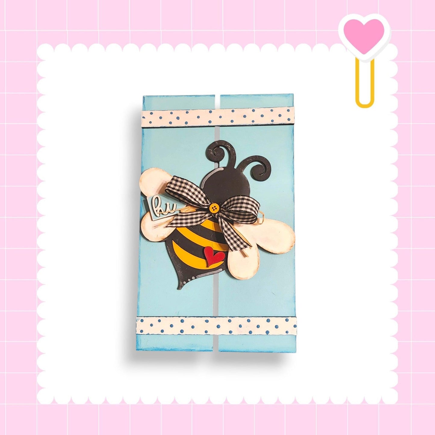 a piece of paper with a bee on it