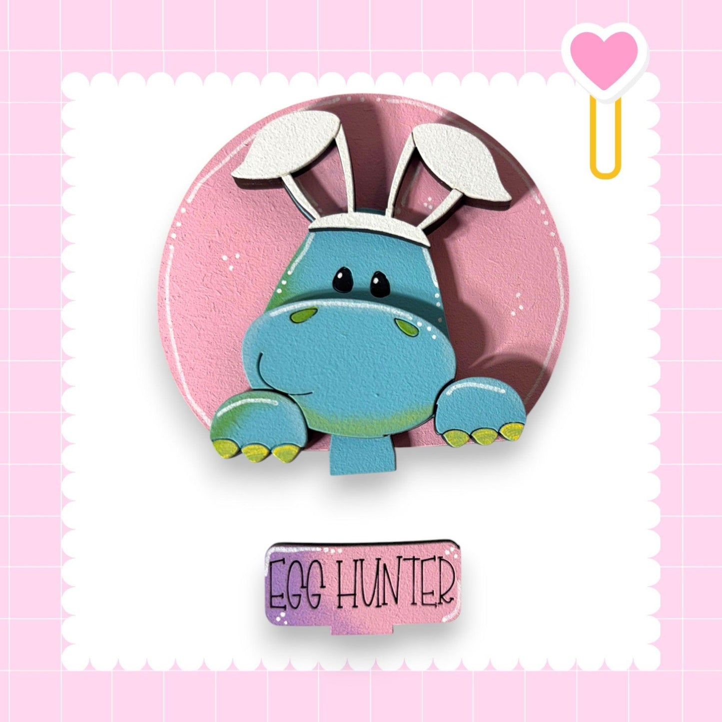 a picture of a cartoon animal on a pink background