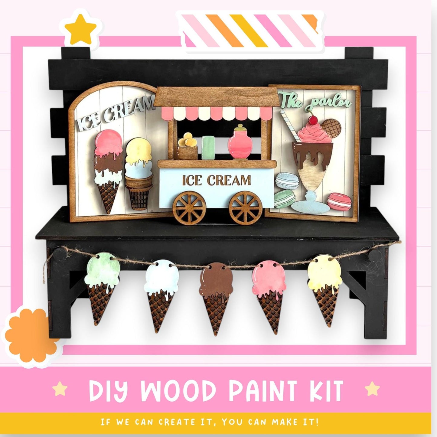 The image is a colorful and whimsical depiction of an ice cream shop, featuring a wooden ice cream stand with various ice cream flavors and toppings. The shop is decorated with paper cutouts of ice cream cones and scoops, creating a playful and inviting atmosphere. The image also includes a DIY wood paint kit, suggesting that the viewer can create their own ice cream shop scene.