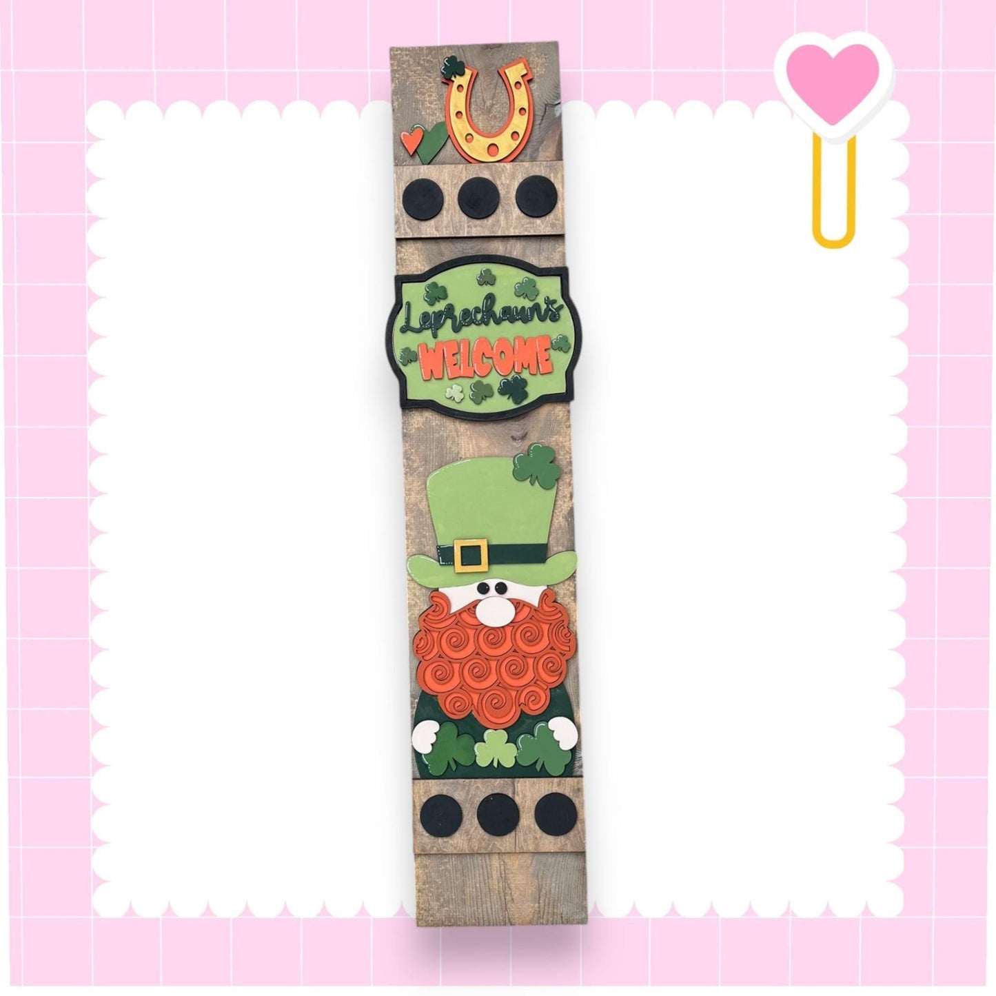 a picture of a wooden clock with a st patrick's day theme