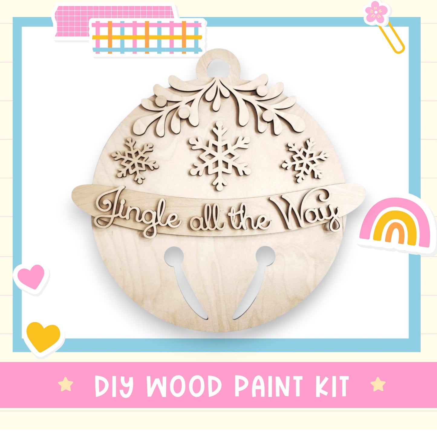 a wooden christmas ornament with a rainbow in the background