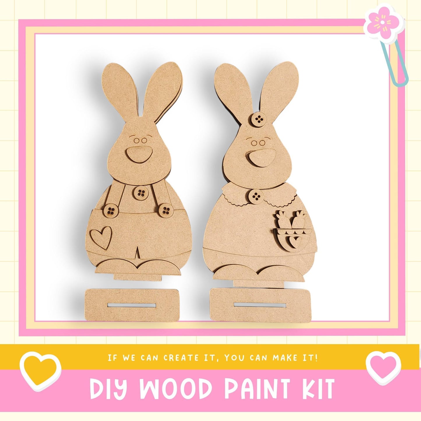 two wooden rabbit figures, each with a heart and a bow, standing on a wooden base. The text below the image reads "DIY WOOD PAINT KIT" and "If we can create it, you can make it!"