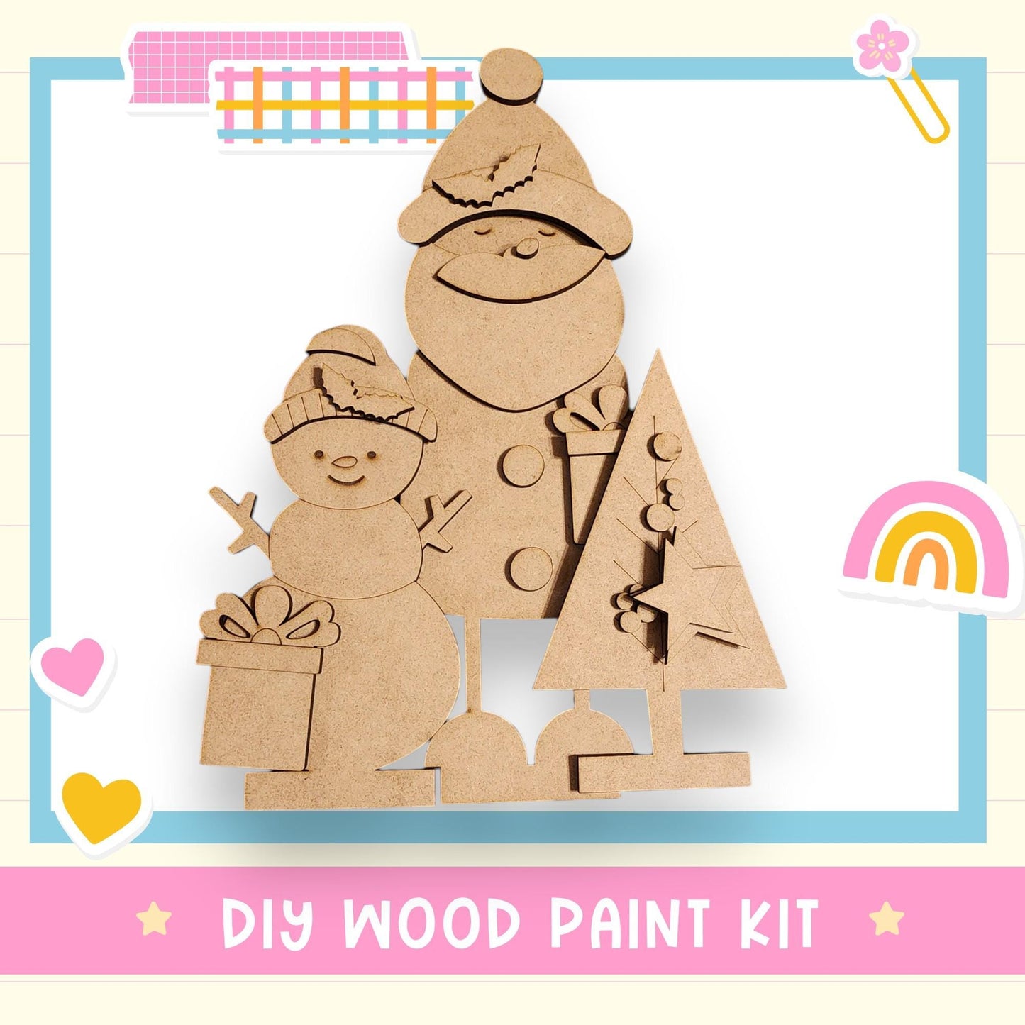 a DIY wood paint kit for creating a snowman and a Christmas tree, with various decorative elements surrounding the kit.