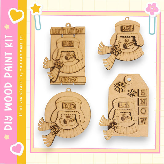 four wooden ornaments, each with a unique design and a winter theme. The ornaments are shaped like a snowman, a snowman with a hat, a snowman holding a snowflake, and a snowman wearing a scarf. The ornaments are displayed against a pink and yellow background, which complements the winter theme.