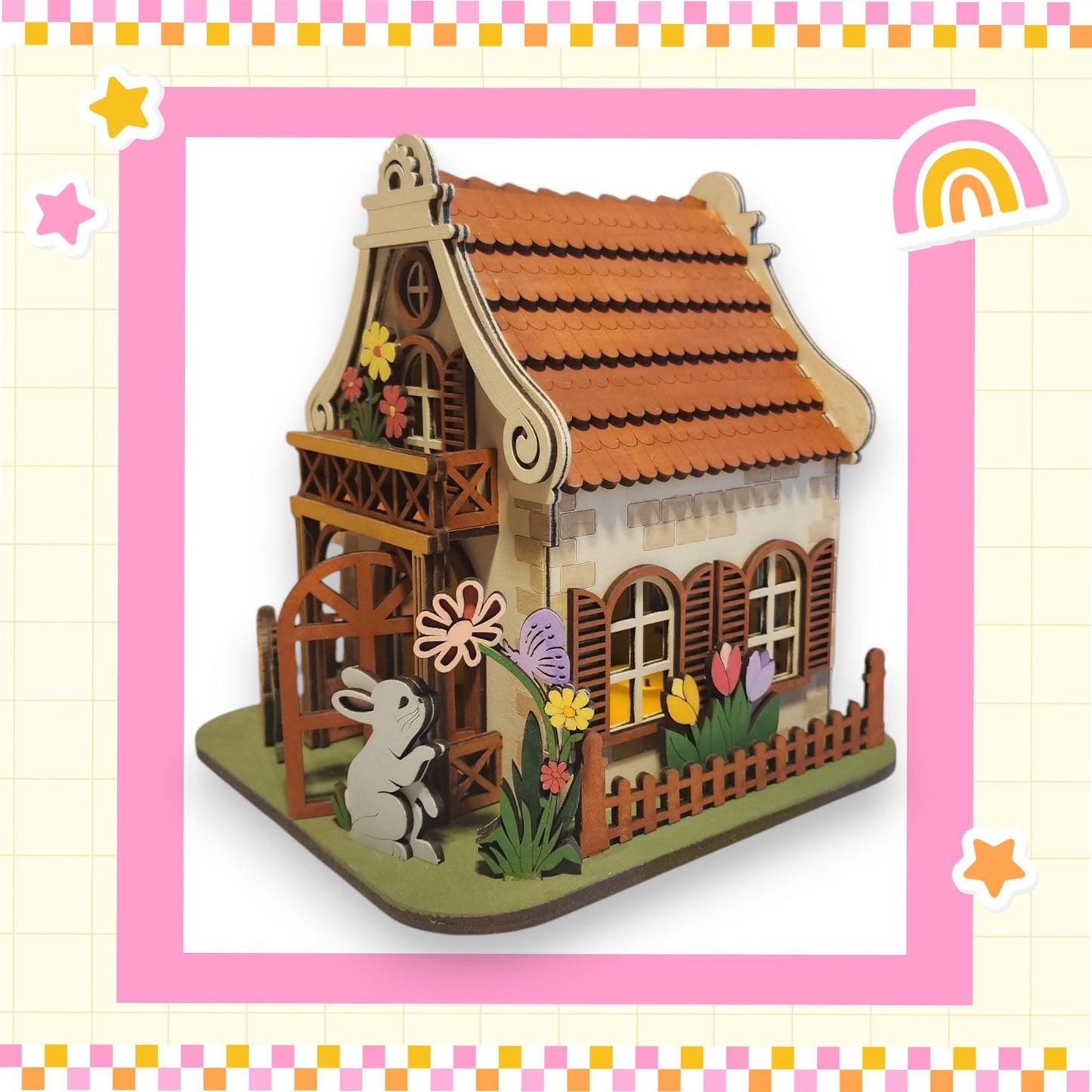 a picture of a house with a bunny on it