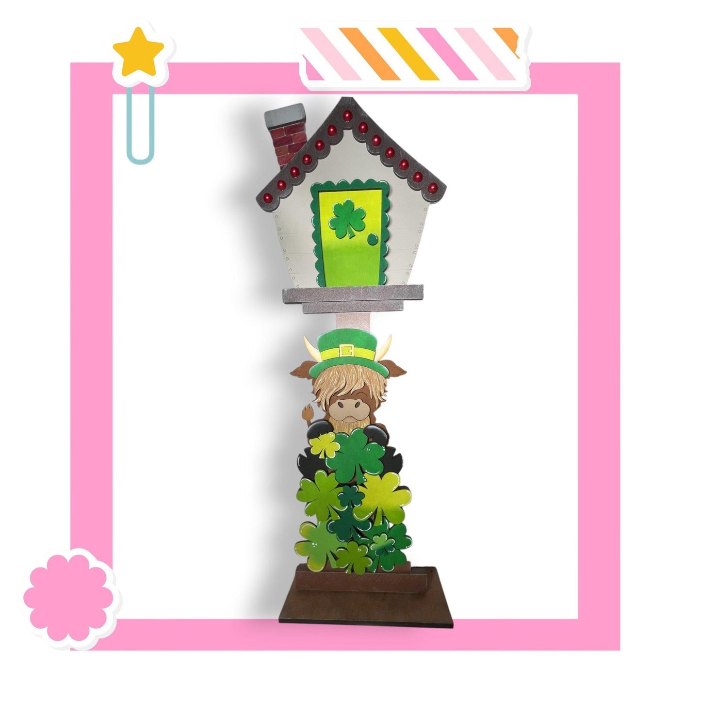 a clock with a man in a hat on top of it