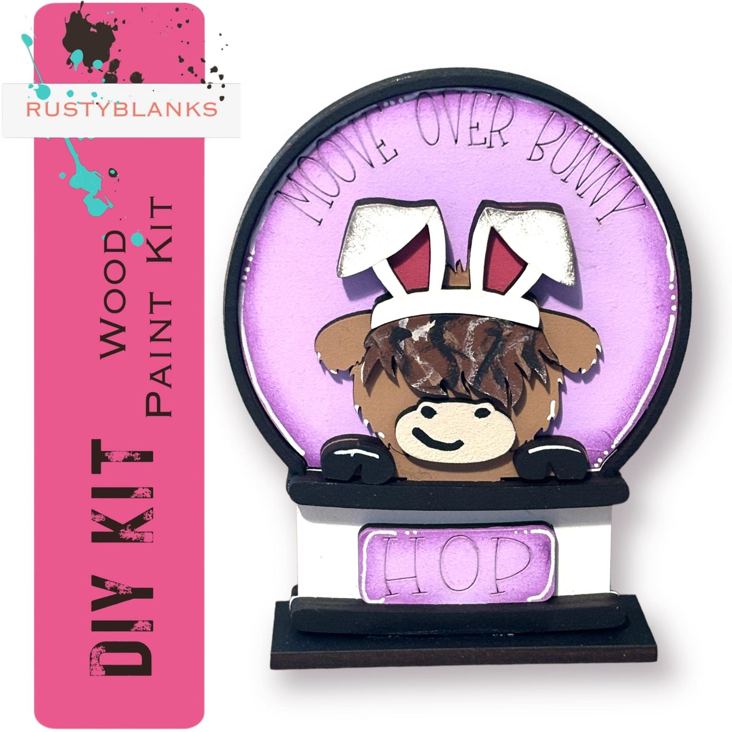 a wooden paint kit with a cartoon rabbit wearing a bunny hat and the word "HOP" written on it.