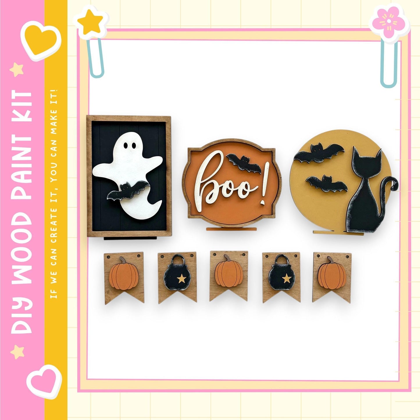 a Halloween-themed display with various spooky and festive elements, including a ghost, a "boo!" sign, a cat, pumpkins, and a banner.