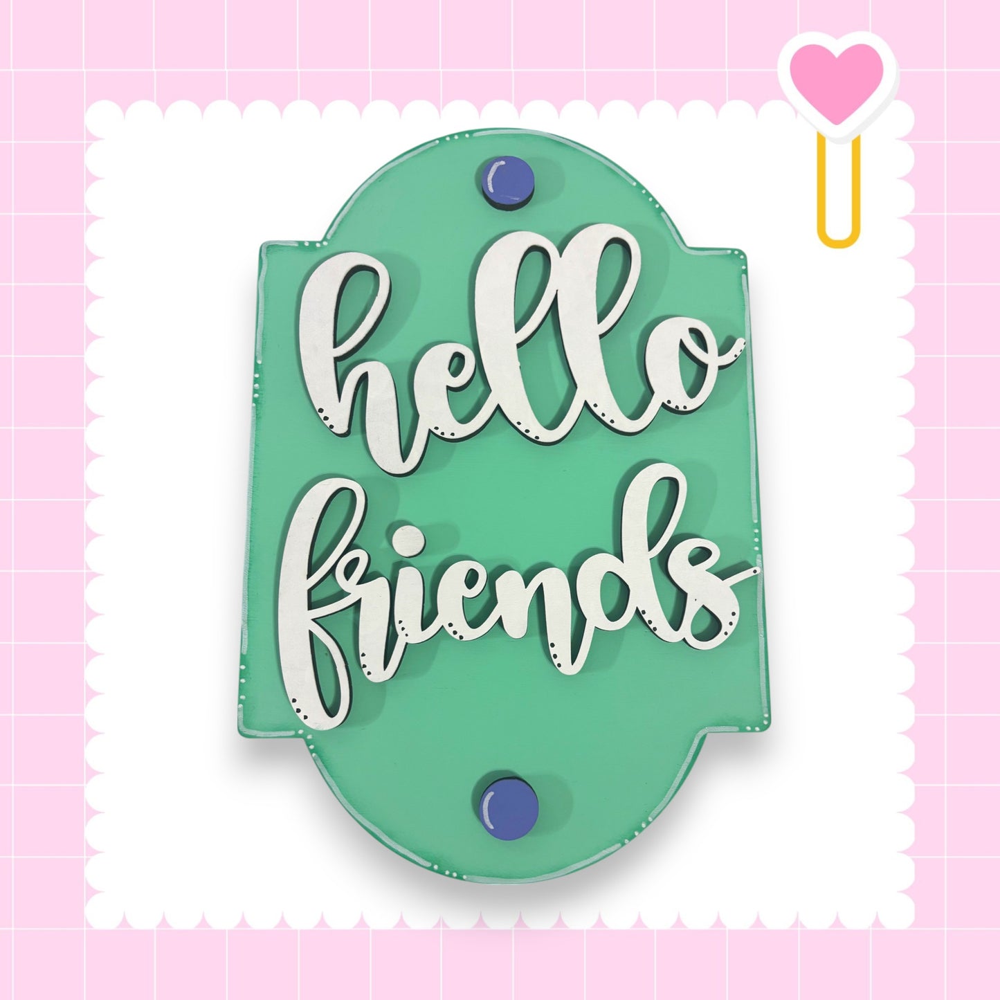 a green sign with the text "Hello friends" written on it.