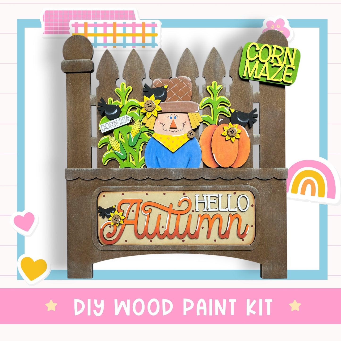The image is a DIY wood paint kit for creating a fall-themed decoration, featuring a scarecrow, corn maze, and a sign that says "Hello Autumn".