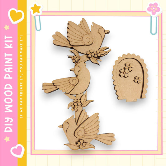 a wooden paint kit with various bird-shaped cutouts and a small birdhouse.