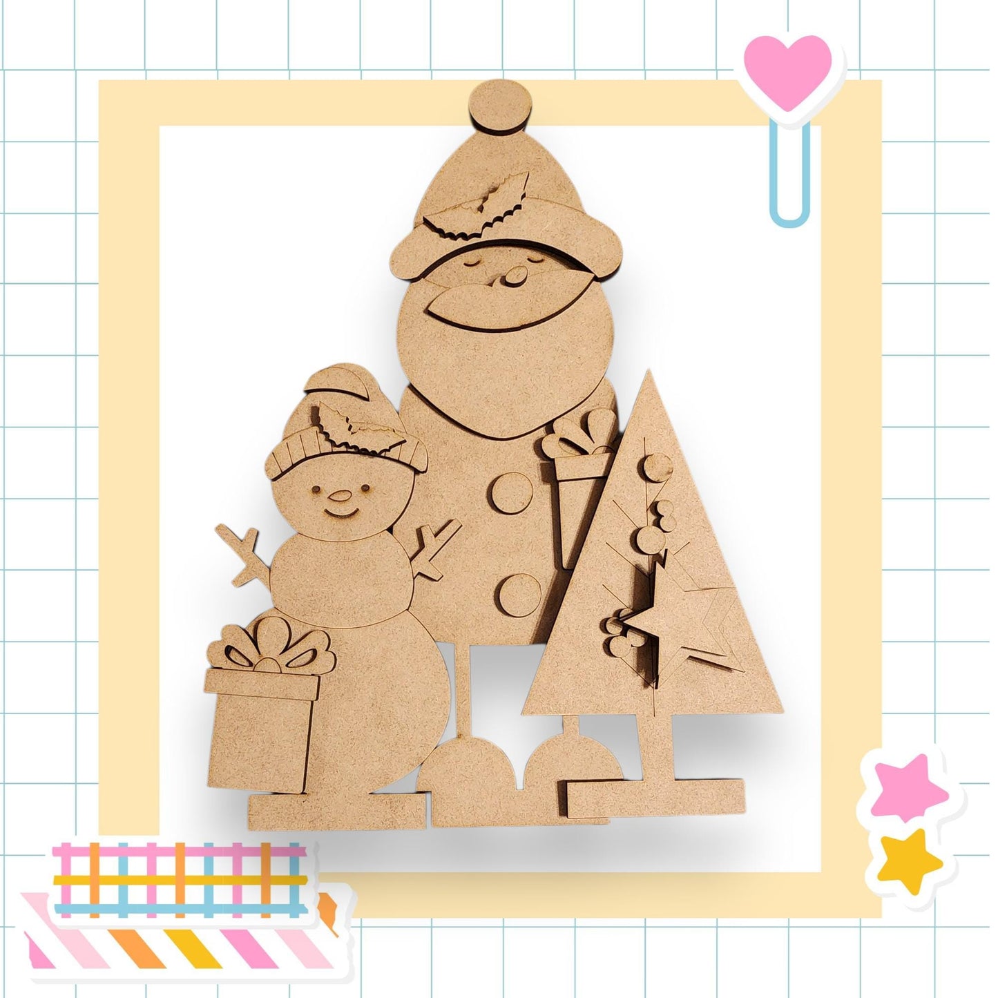 A cardboard snowman and a cardboard Christmas tree are depicted in the image, set against a grid background with various colorful stickers.
