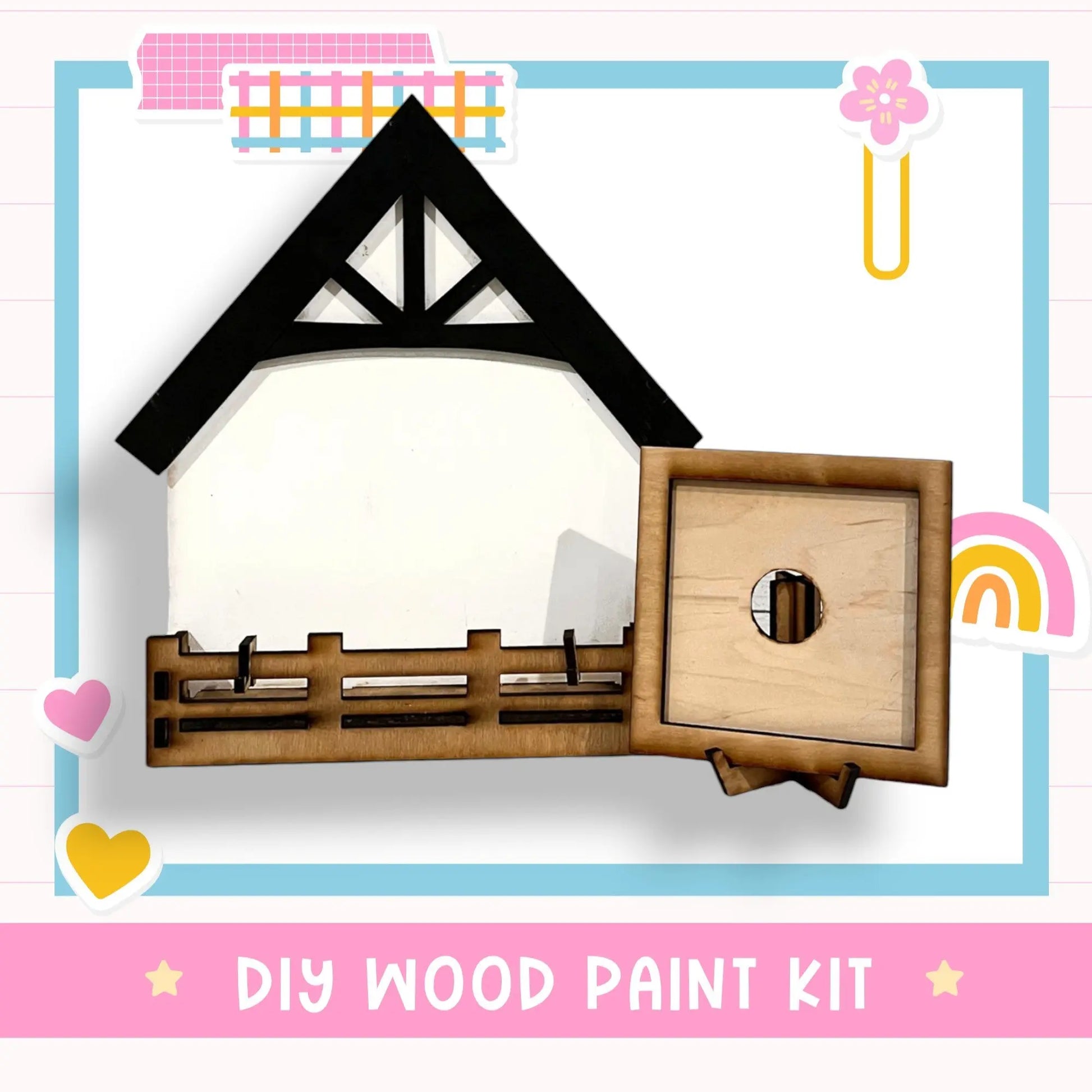 a wooden paint kit with a picture of a house