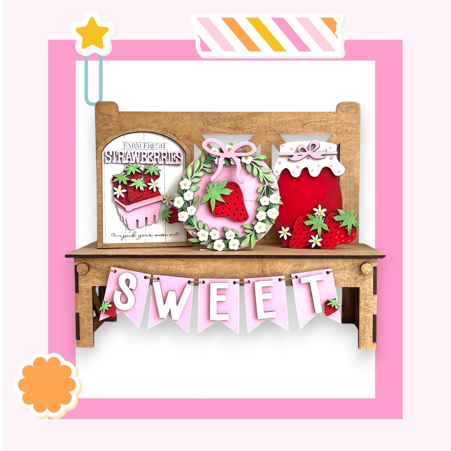 a card with a strawberry cake and a pink banner