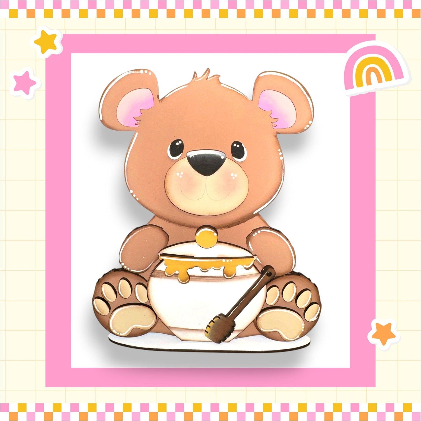a brown teddy bear sitting on top of a bowl