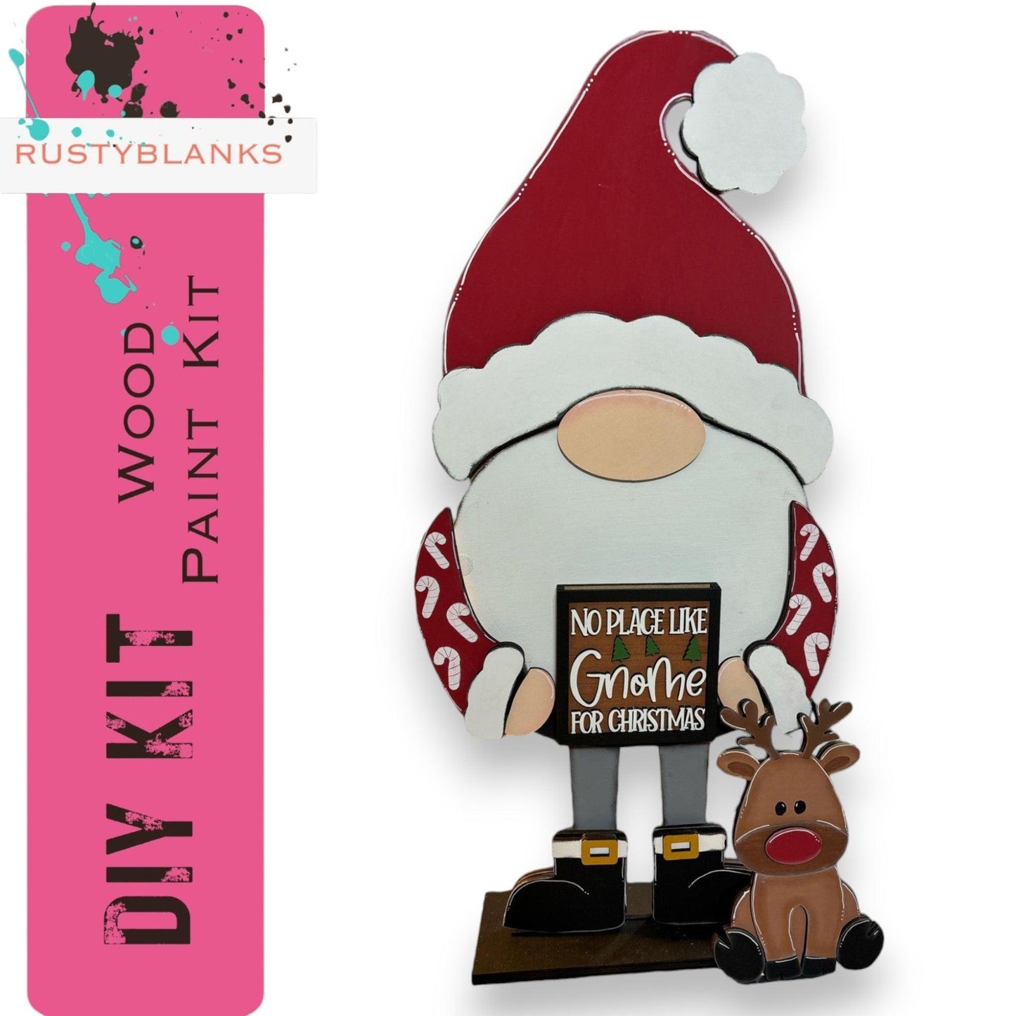 a christmas decoration with a santa clause holding a sign