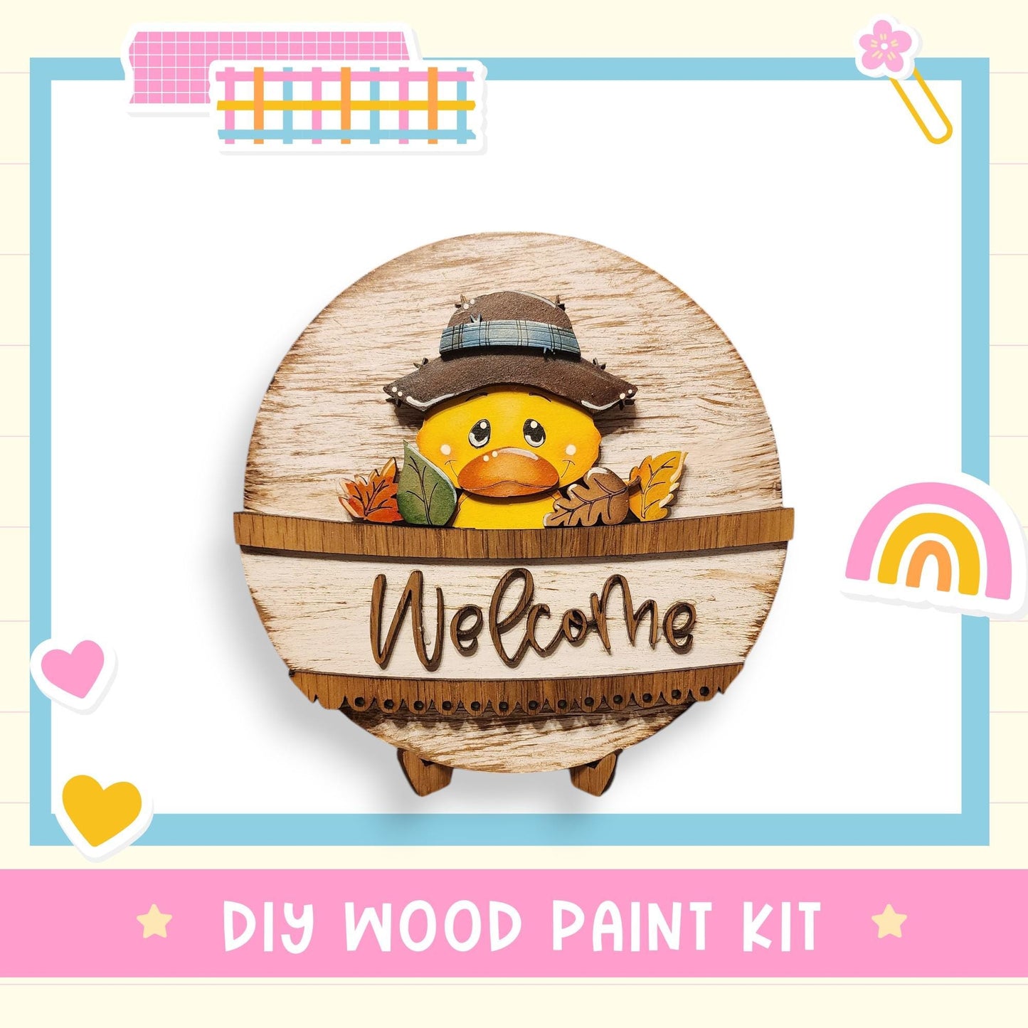 a wooden sign with a duck wearing a hat and the word "Welcome" written on it. The sign is surrounded by various colorful stickers and illustrations, creating a cheerful and welcoming atmosphere.