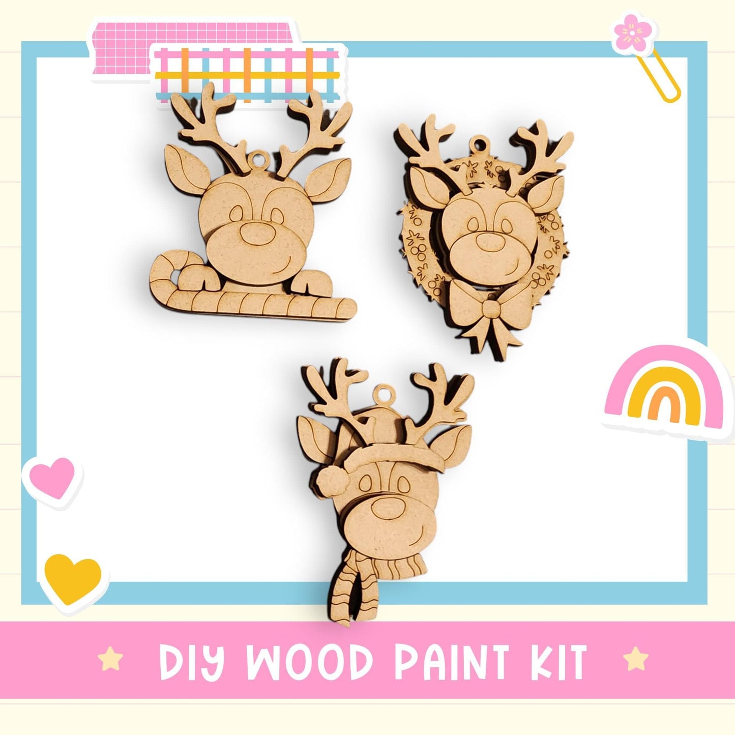 a DIY wood paint kit with three wooden reindeer ornaments, each with unique designs and decorations.