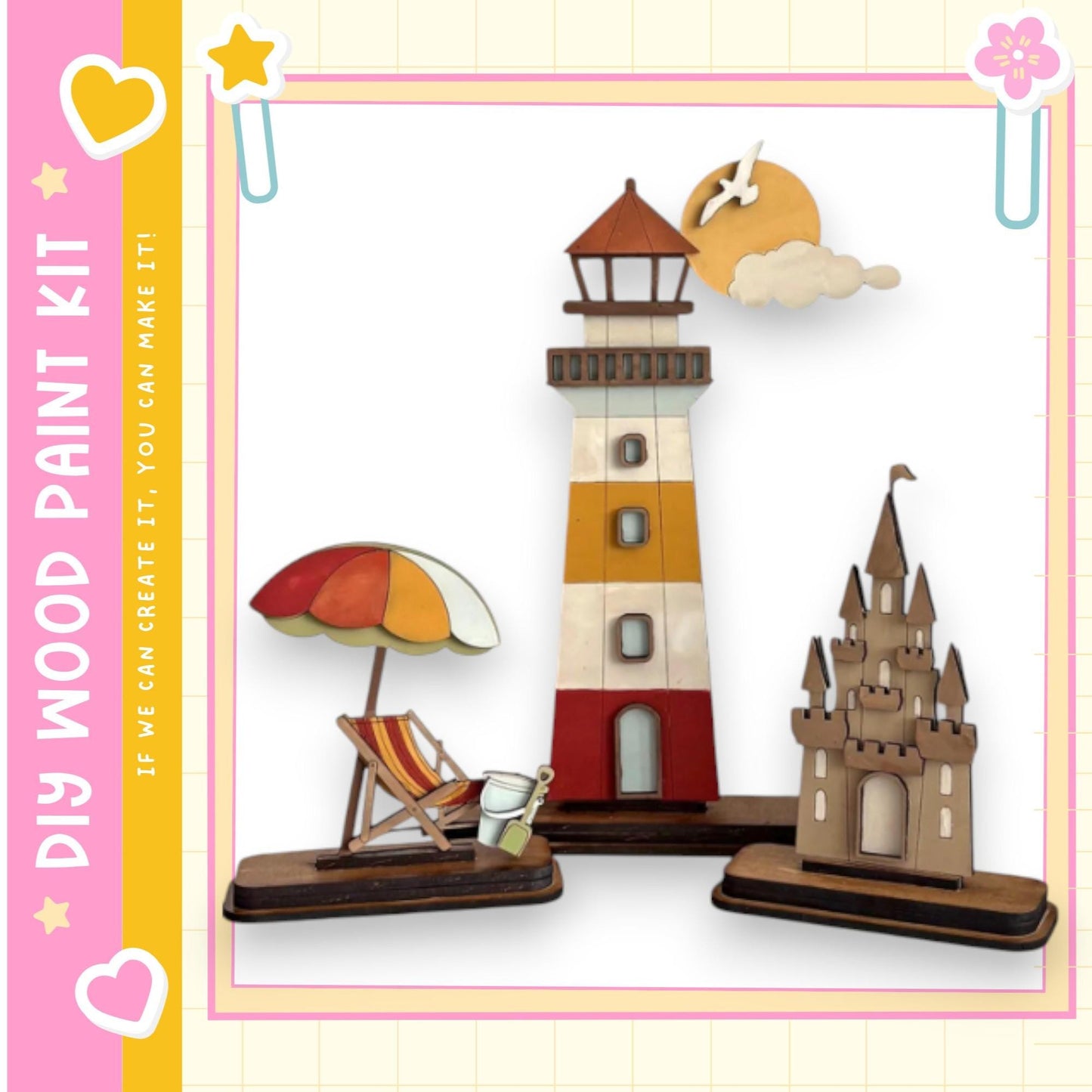 a wooden paint kit with various miniature figures, including a lighthouse, a castle, and a beach umbrella.