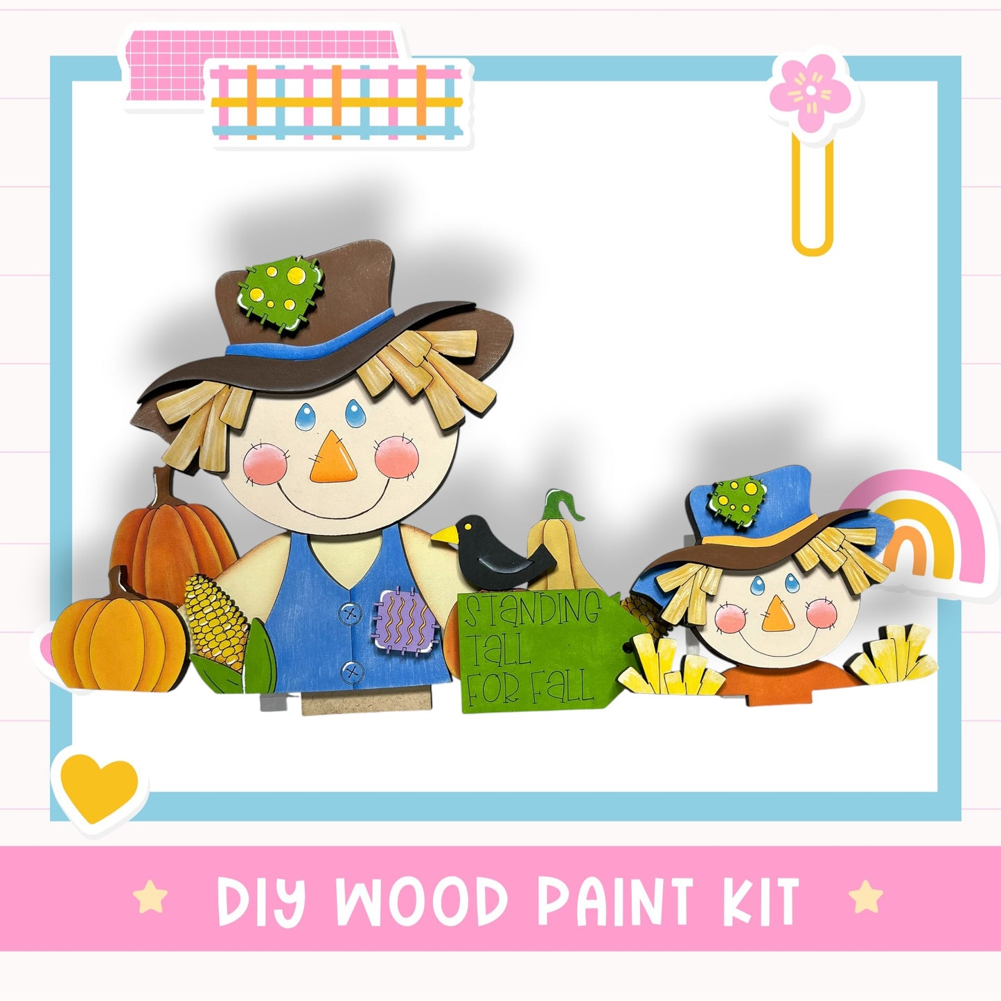 The image is a colorful illustration featuring a scarecrow and pumpkins, with the text "DIY WOOD PAINT KIT" at the bottom.