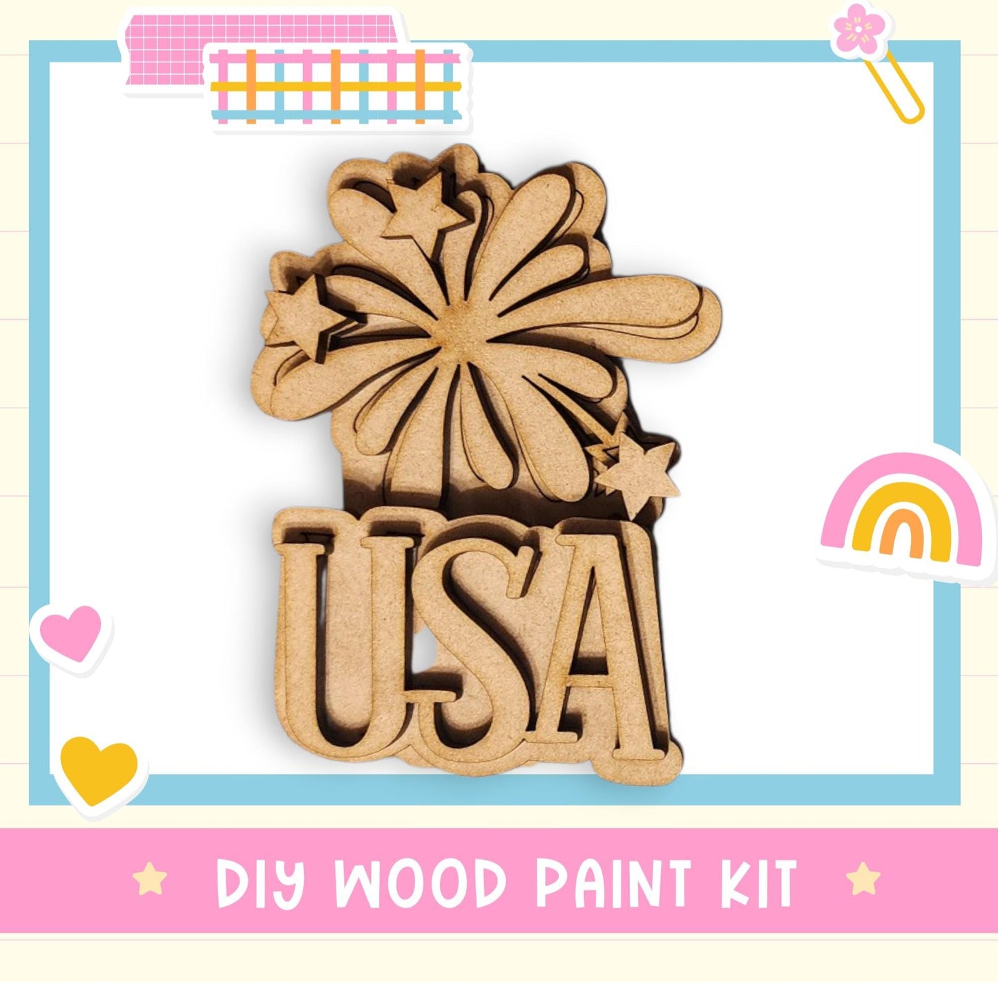 a wooden cutout of the word usa with a rainbow in the background