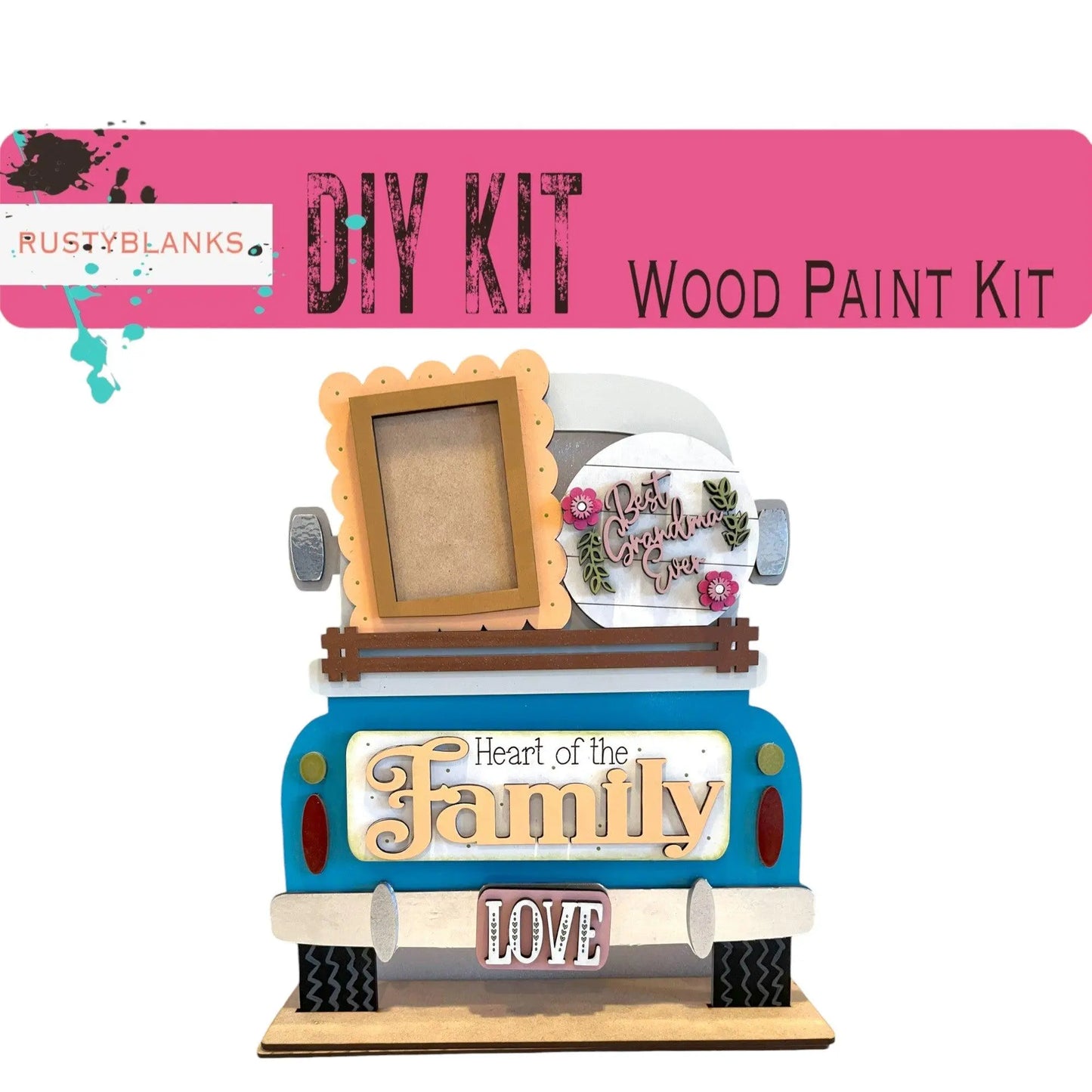 a blue truck with a picture frame on top of it