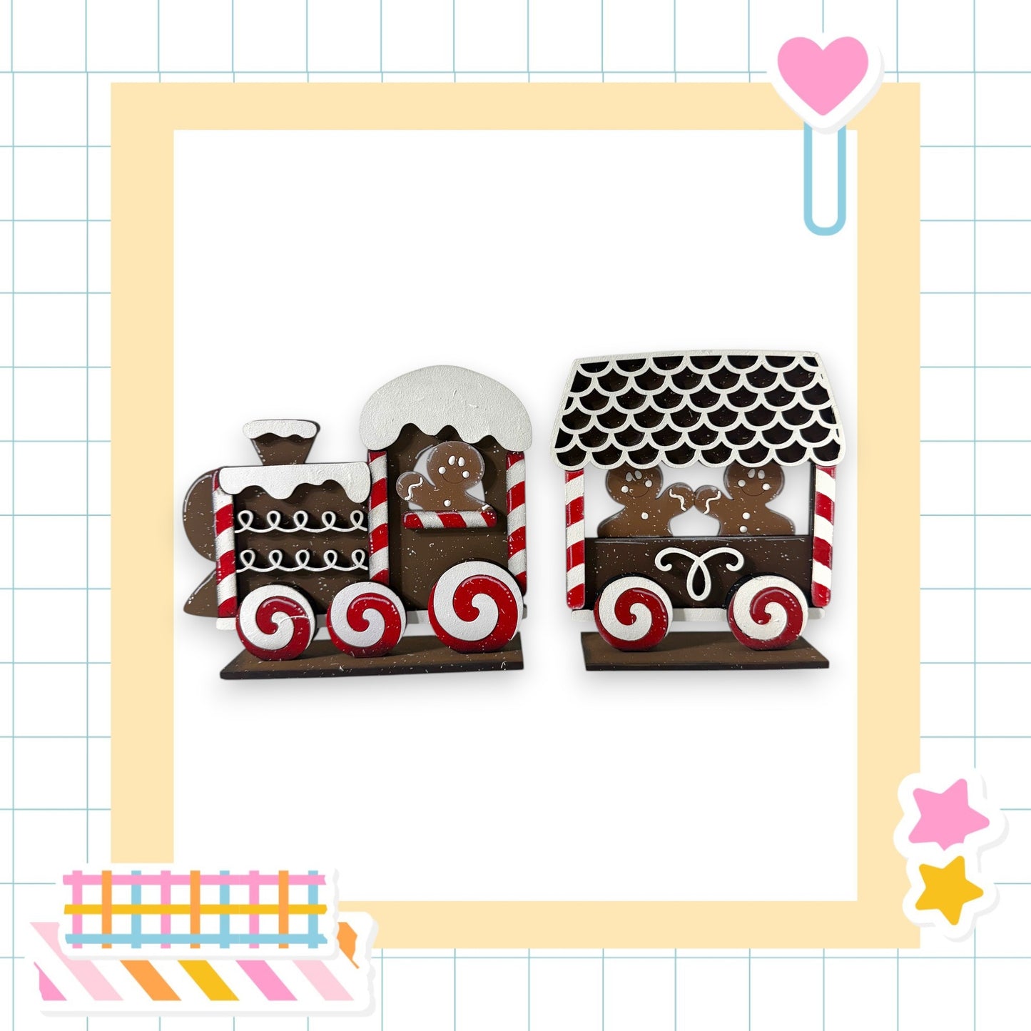 A wooden train made of gingerbread cookies, with a black roof and red and white striped wheels, is displayed against a white background.